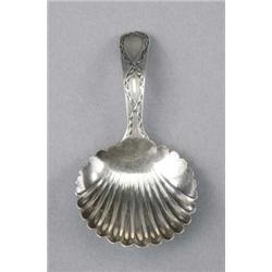 A George III silver Old English pattern caddy spoon, with shell shaped bowl, the stem bright-cut...