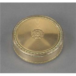 A George III two-colour gold circular engine turned box and cover, with applied formal leaf rims,...