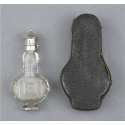A George III silver mounted glass perfume flask, of slice cut and fluted flattened baluster form,...