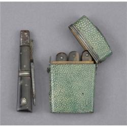 A George III shagreen etui, with reeded silver coloured metal mounts and vacant escutcheon, conta...