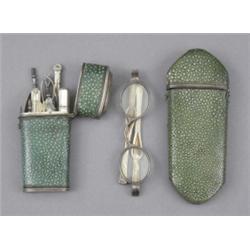 A George III shagreen etui, of tapering form, reeded silver coloured metal mounts, containing nin...