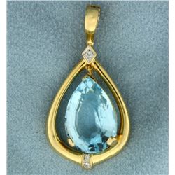 12 ct Blue Topaz and Diamond Pendant