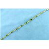 Image 3 : Unique Knot Link 4.5ct TW Peridot Gold Bracelet