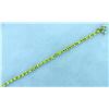 Image 1 : Peridot and Blue Topaz Dragonfly Bracelet in 14k Gold