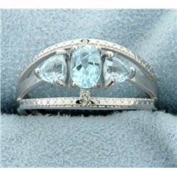 Three Stone Blue Topaz Ring with Diamonds