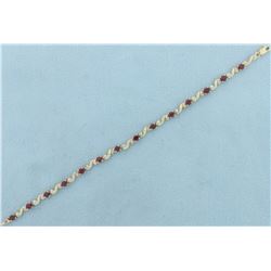 3ct TW Ruby and Diamond Bracelet in 14k Gold