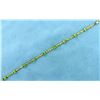 Image 1 : Unique Knot Link 4.5ct TW Peridot Gold Bracelet