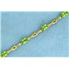 Image 2 : Unique Knot Link 4.5ct TW Peridot Gold Bracelet