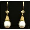 Image 1 : Pearl and Diamond Dangle Drop Earrings in 14k Gold