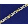 Image 2 : 1/2ct TW  Diamond Tennis Bracelet in 10K White and Yellow Gold