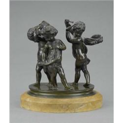 A 19th century bronze group of three infant bacchic revellers, each standing naked, one beating a...