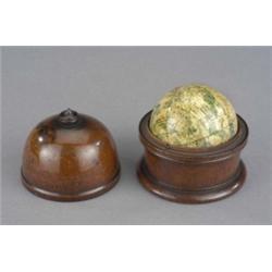 Newtons Improved Pocket Celestial Globe, 7.5cm diam, in moulded mahogany cylindrical case, the do...