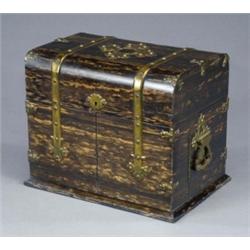 A good Victorian coromandel wood folding enclosed tantalus, the pierced gilt brass strapwork moun...