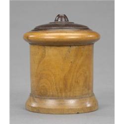 An early Victorian lignum vitae cylindrical string box, with moulded base and pierced domed mould...