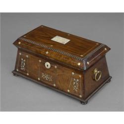An early Victorian rosewood two compartment tea caddy, of flared rectangular sarcophagus form, th...