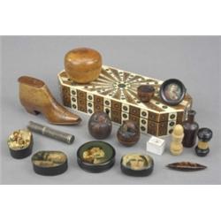 A 19th century Indian sandalwood, ivory and intarsia work canted oblong box, the top with radiati...