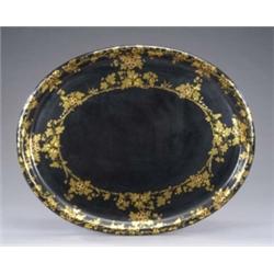 An early 19th century black papier mache oval tray, with a broad border of matt and burnished gil...