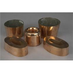 Copper - an early 19th century saucepan, with pierced iron handle, 26cm diam; two tapering cylind...