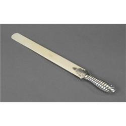 A good Victorian silver mounted ivory page turner, with spirally fluted silver handle, bright cut...