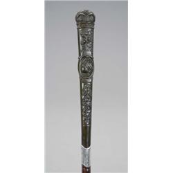 Queen Victoria Diamond Jubilee, a malacca cane, the commemorative handle moulded with profile bus...