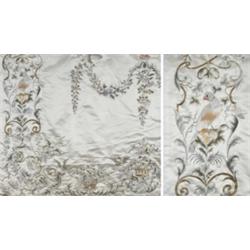 A fine large 19th century Chinese embroidered silk bed cover, worked to the centre with swags and...