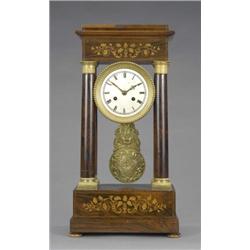 A French ormolu mounted rosewood portico clock, the circular dial with Roman chapter ring and bea...