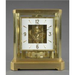A Jaeger-le-Coultre Atmos mantel clock, the square white enamelled chapter ring with Arabic and b...