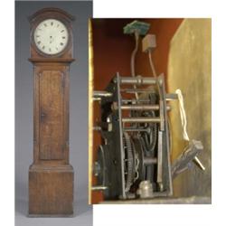 An oak longcase clock, the circular 32cm dial with Roman chapter ring and calendar aperture, thir...