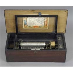 A Swiss keywind cylinder musical box, the 20cm cylinder to play twelve airs listed on a lithograp...