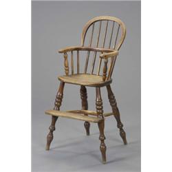 A child's ash stick back Windsor high chair, with crinoline stretcher, third quarter 19th century...