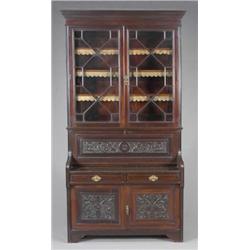 A Victorian mahogany bookcase-secretaire, enclosed by a pair of bevelled thirteen-pane astragal m...