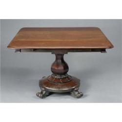 A William IV mahogany pembroke dining table, with ovolo moulded D-shaped leaves above a breakfron...