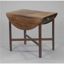 A George III mahogany pembroke table, with semi-circular leaves, the arched frieze with a shallow...