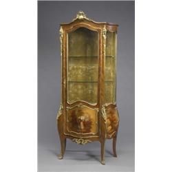 A compact gilt brass mounted kingwood vernis Martin vitrine, of serpentine form with shaped sides...