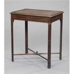 A small Edwardian mahogany Chippendale revival 'silver' table, the moulded rectangular top with r...