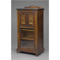 A Victorian rosewood music cabinet, with engraved bone and boxwood inlays of ribbon capped urns a...