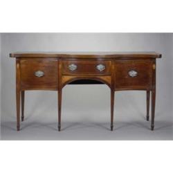 A George III mahogany serpentine sideboard, the arched centre with a drawer flanked by a cupboard...