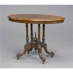 A Victorian walnut occasional table, the quartered burr veneered oval top with shallow strung fri...