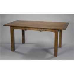 An oak centre table, in the manner of Charles Rennie Mackintosh, the cleated four-board top above...