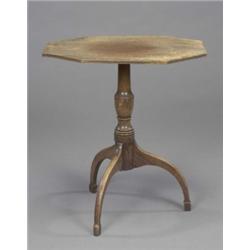 A George III mahogany occasional table, the reeded canted rectangular top on a vase turned pillar...
