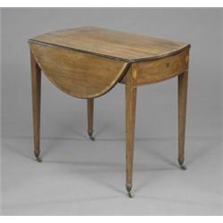 A George III mahogany oval pembroke table, with crossbanded borders and harlequin stringing, bow...