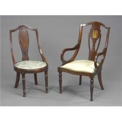 Two Edwardian mahogany nursing chairs, one with open arms, inlaid with stringing and neo-classica...