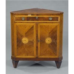 An early 19th century Dutch kingwood splay-front corner cabinet, with matched veneers, the top wi...