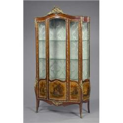 A good brass mounted kingwood vernis Martin serpentine vitrine, in Louis XV style, the green silk...