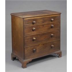 A George III mahogany chest, fitted two short and three long graduated cockbeaded drawers, later...