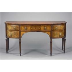A good late 19th century mahogany bow breakfront sideboard, in Sheraton revival style, with satin...