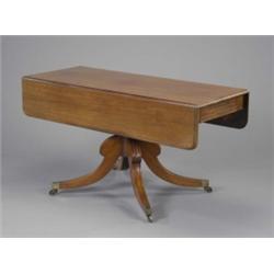 A George IV mahogany pembroke breakfast table, with D-shaped leaves, a drawer to one end, the tur...