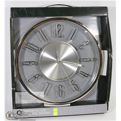 HOMETRENDS  CHROME & TRANSPARENT WALL CLOCK