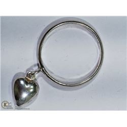 36) STERLING SILVER RING WITH HEART SHAPED DANGLE