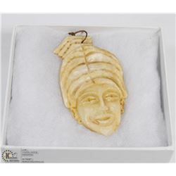 HAND CARVED PENDANT FROM OYSTER SHELL